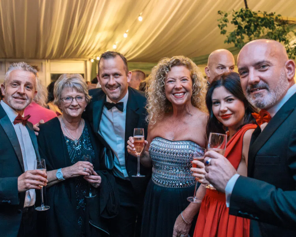 breast cancer charity supporters at annual ball event