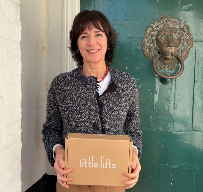 Anne-Marie McCarthy Little Lifts Trustee with Gift Box