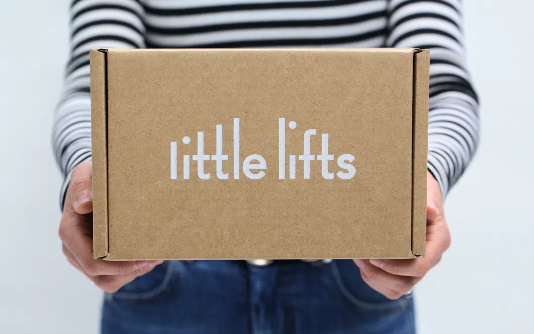 Founder, Oa, holding Breast Cancer Charity Chemotherapy Gift Box