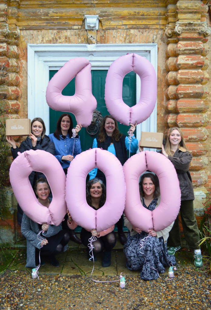 Breast Cancer Charity Team Celebrating 40000th Box