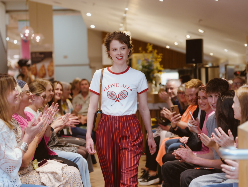 Breast cancer charity fashion show model