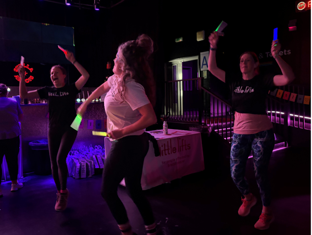 Breast cancer charity team at fitness festival