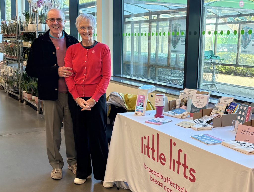 Breast cancer charity volunteers Trish and Leon at awareness stand