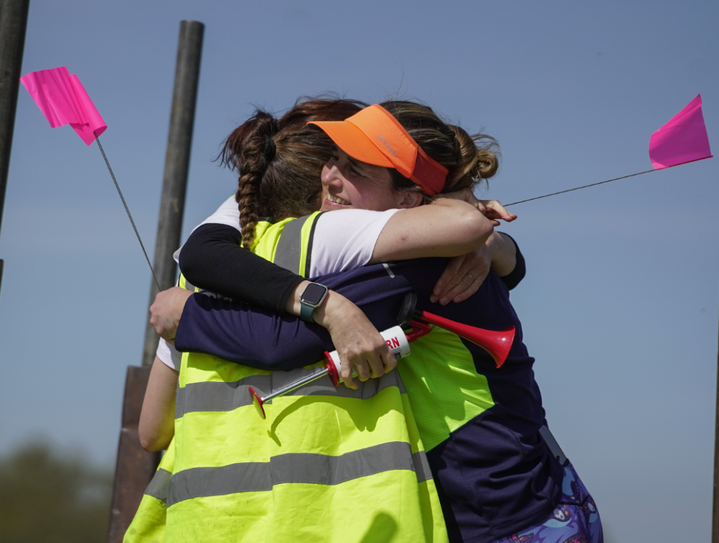 Little Lifts Team Hugging at Event