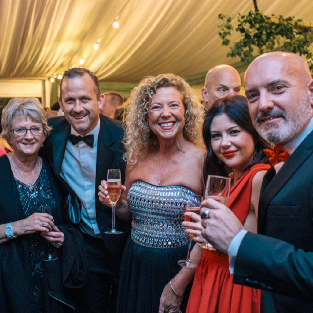 breast cancer charity supporters at fundraising ball