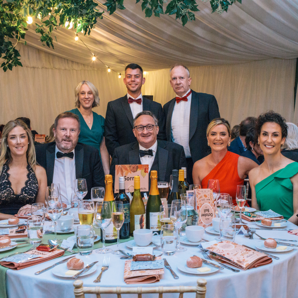breast cancer charity supporters at fundraising ball