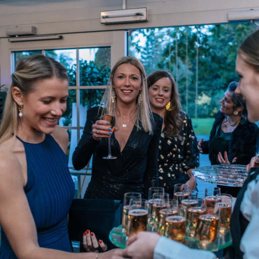 breast cancer charity supporters at fundraising ball
