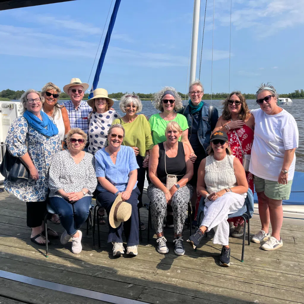 People affected by breast cancer at boat trip charity event