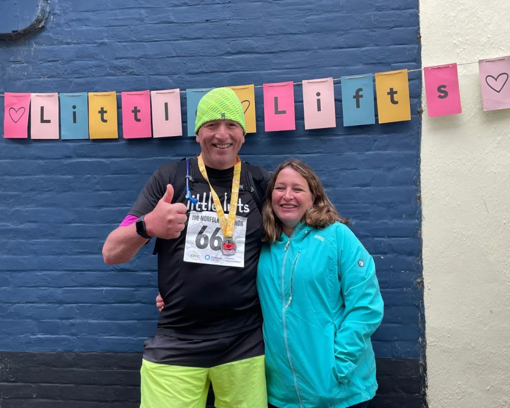 Breast cancer charity fundraiser and beneficiary after marathon run