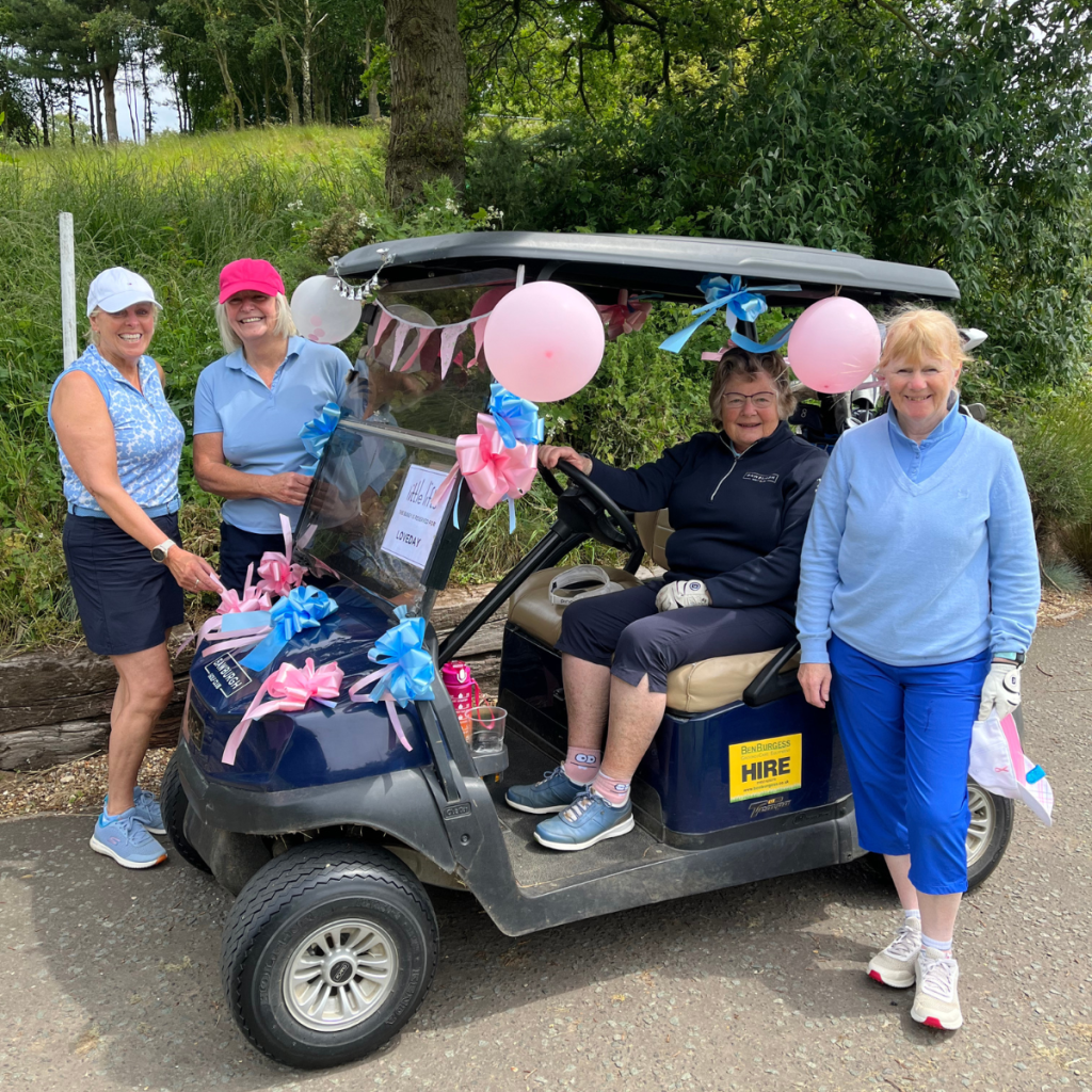 Breast cancer charity supporters at annual golf day fundraising event