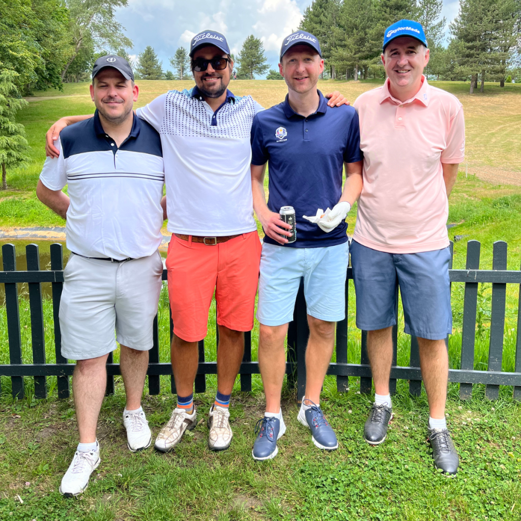 Breast cancer charity supporters at annual golf day fundraising event