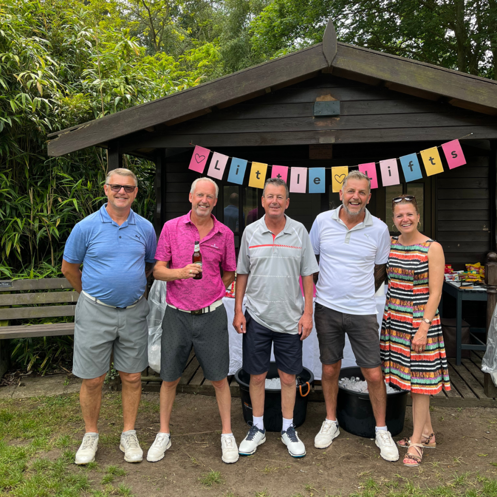 Breast cancer charity supporters at annual golf day fundraising event