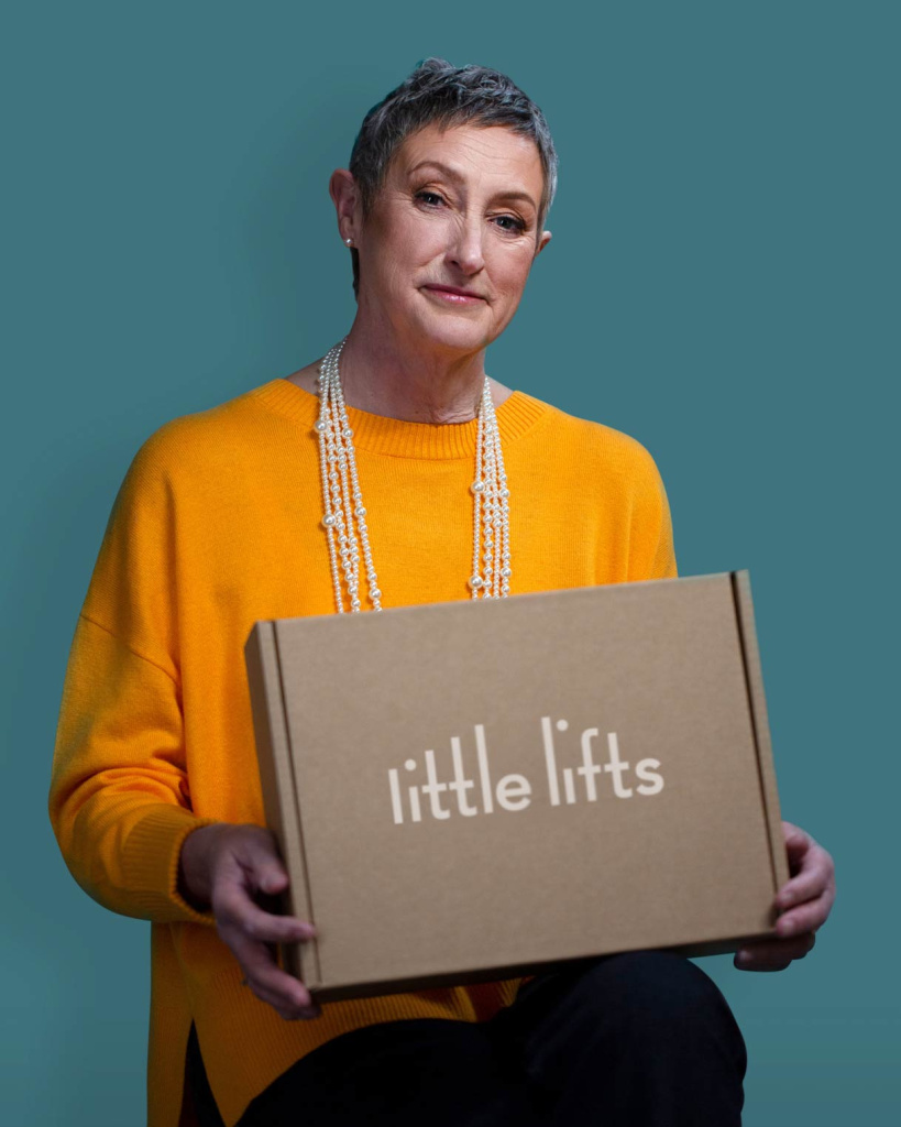 Breast cancer charity beneficiary with gift Box
