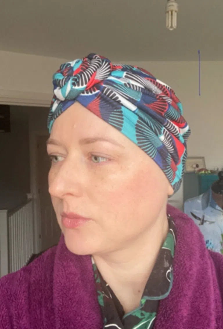 Stretchy head covering for breast cancer treatment