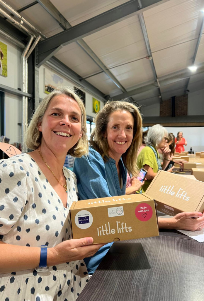 The Bald Box Founders and Little Lifts Beneficiaries with Breast Cancer Gift Boxes