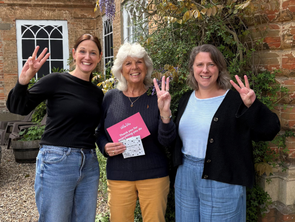 Tor and Hannah with breast cancer charity volunteer Lorraine