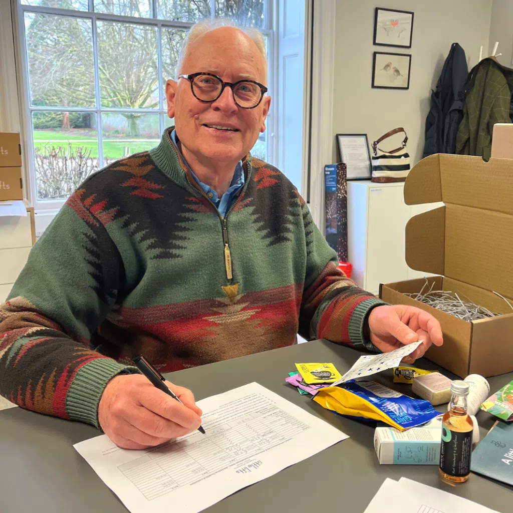 breast cancer charity volunteer Graham packing gift Boxes