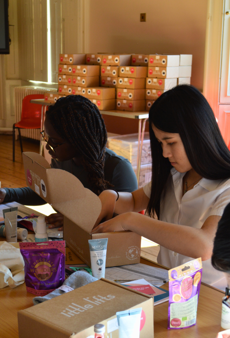 breast cancer charity gift box packing party