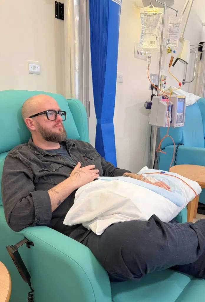 James receiving treatment for breast cancer in hospital