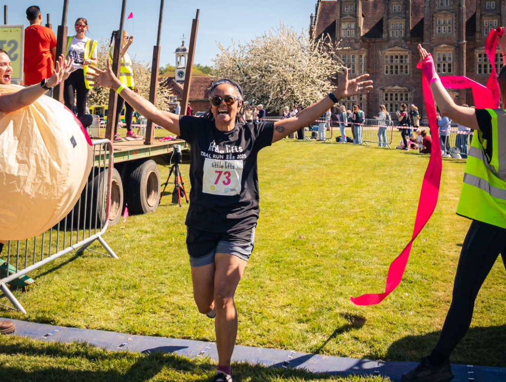 trail runner at finish line